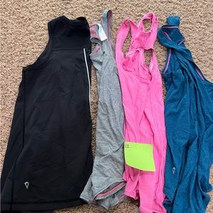 Lot of 4 Ivivva tanks, sz 12